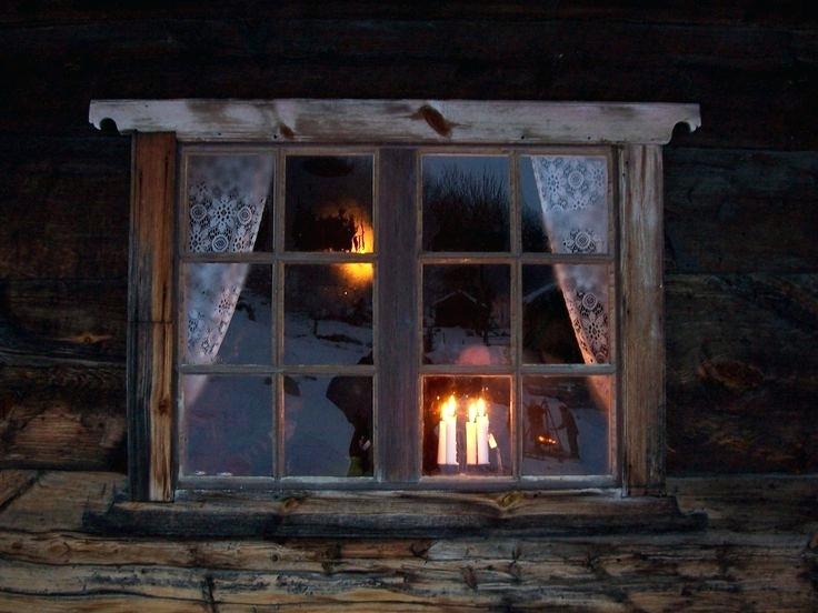 candle-in-window-candle-light-in-the-window-on-the-outside-looking-in-christmas-window-candle-lights-solar